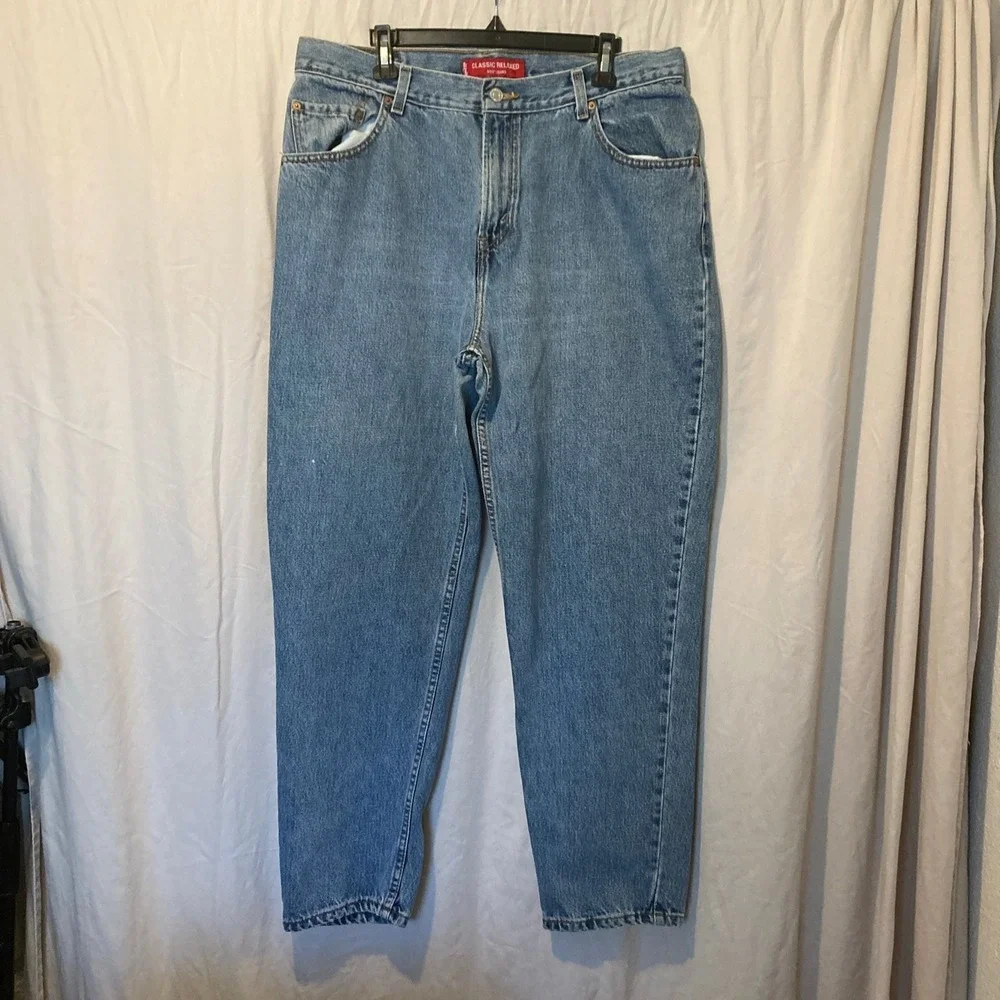 Vintage Levis 550 Classic Relaxed Tapered Jeans Medium Wash Blue Denim 16M y2k